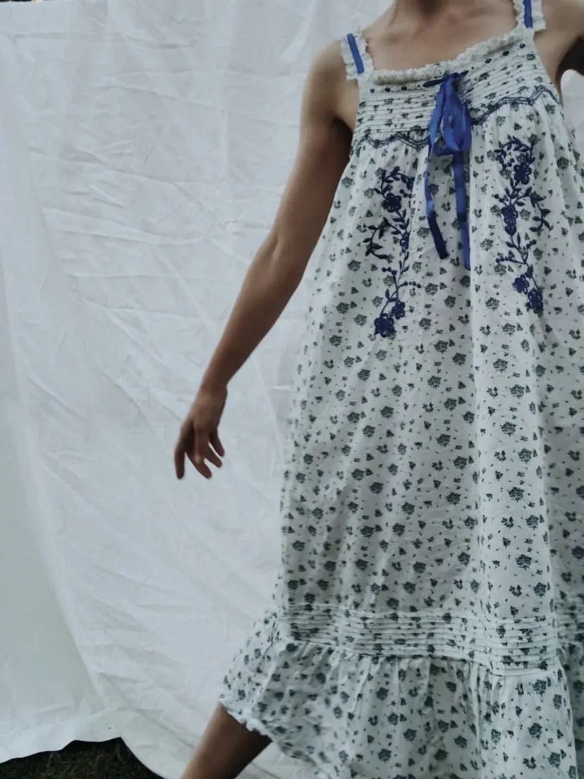 100% RECYCLED COTTON - NIGHTINGALE HAND SMOCKED MIDI DRESS BLUE ROSE FLORAL